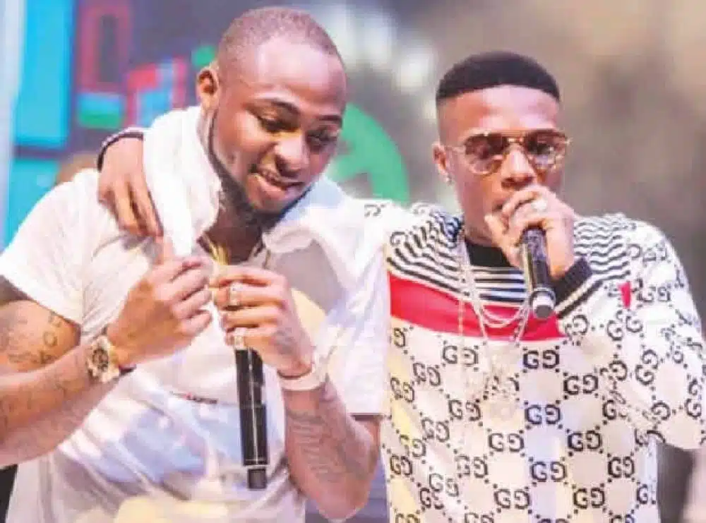 “Two elephants” — Reactions as Davido and Wizkid finally reunite after long term beef