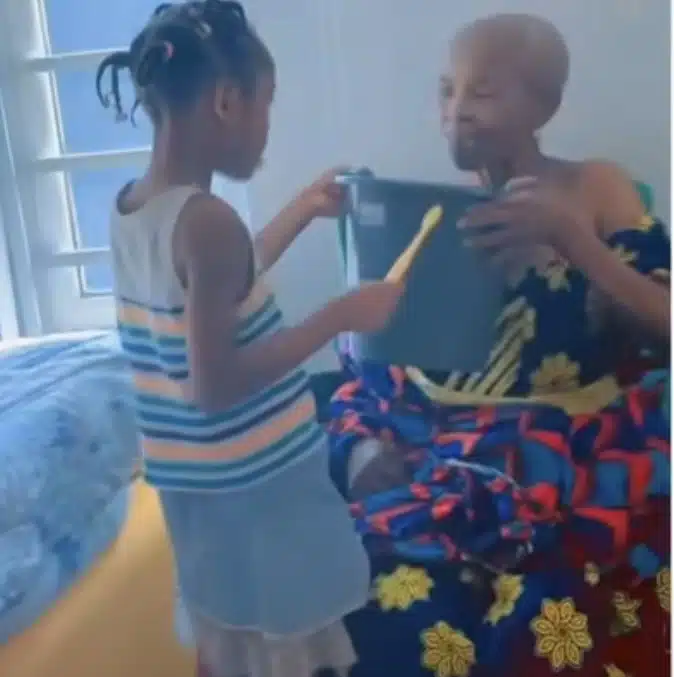Tender moment young girl takes special care of her aged grandmother melts hearts