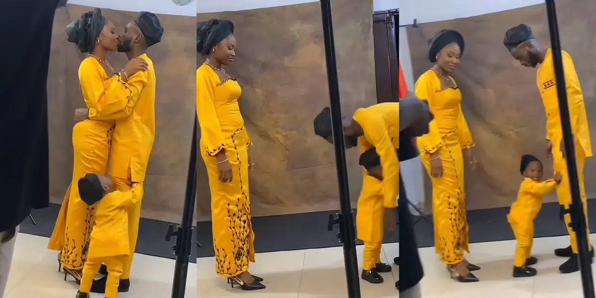 “May the best man win” — Reactions as little boy fights his father for kissing his mum during photoshoot