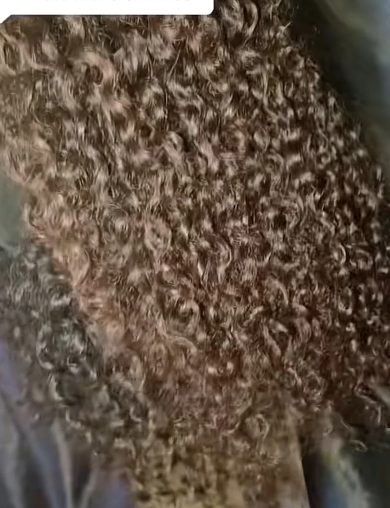 “If you walk fast nobody go know” — Reactions as lady shows off sorry state of 120k wig she purchased 