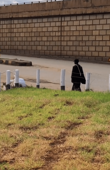 "Is he an Orphan? " - Young man walks home alone after finishing school in his graduation gown