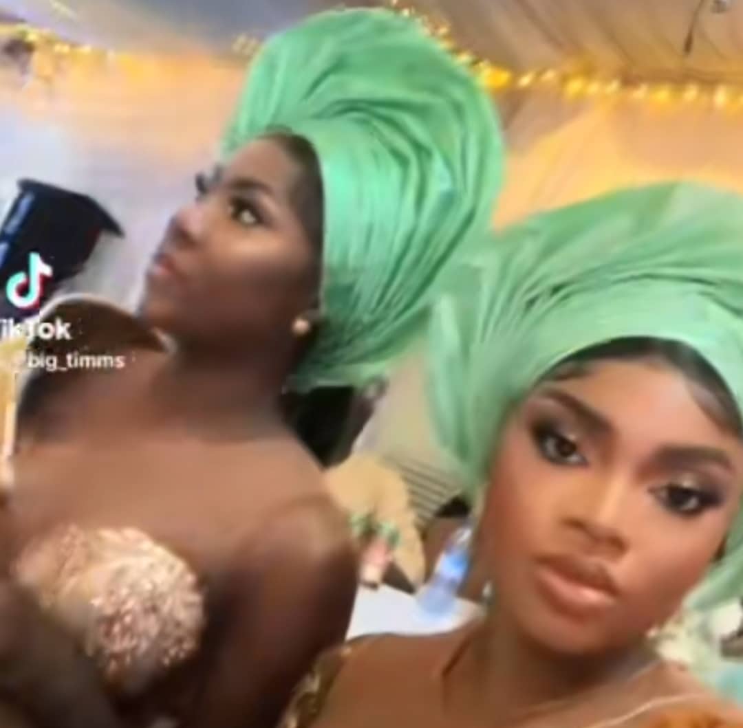 "Only at Yoruba party" - Lady overfed at party stuns many as she begs friend, servers to stop serving her food and drinks