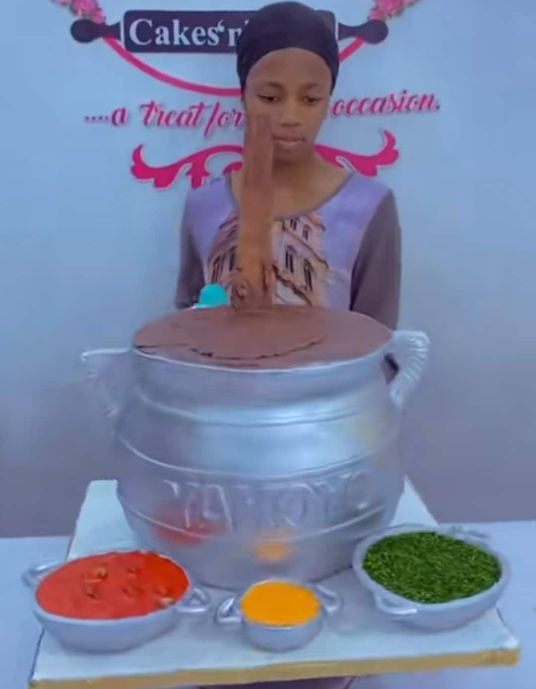 "This is so beautiful" - Nigerian Baker sets TikTok on fire with beautiful cake resembling a traditional cooking pot