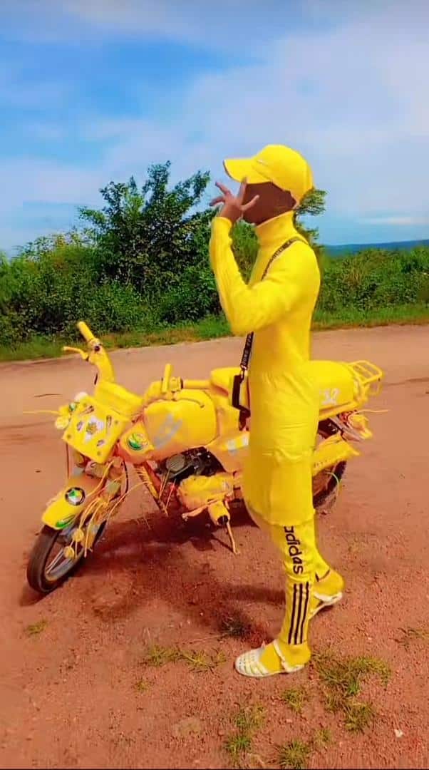 Man crowned 'MTN Ambassador' as he rocks matching yellow outfit with his bike