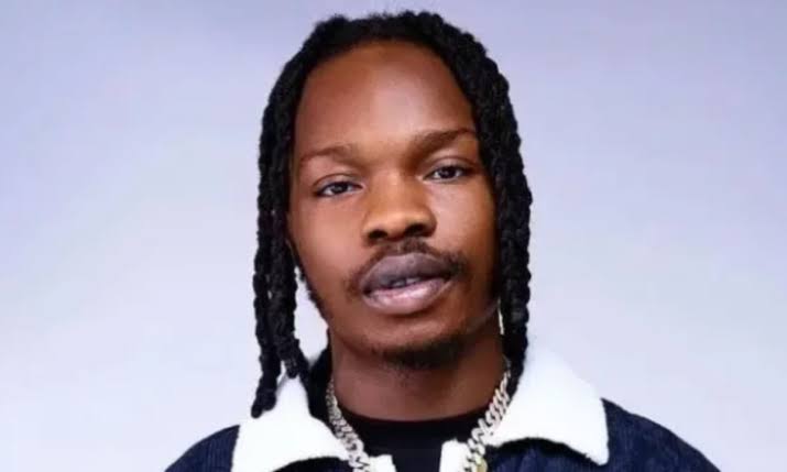 "Useless charity" - Masked man ridicules Naira Marley over noodles, drink gifts to charity home after Mohbad's death
