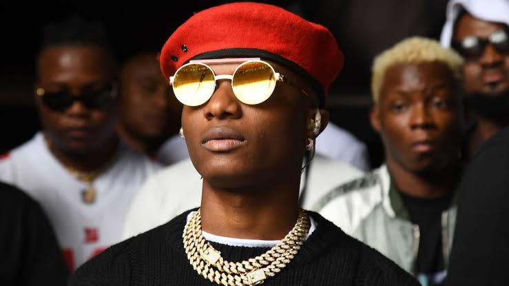 "All paid for" - Wizkid flaunts ₦1.4 billion Ferrari SF90