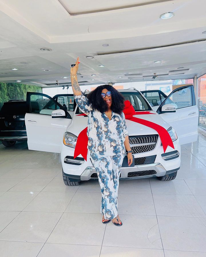 Nkechi Blessing and her brand new car for Christmas 