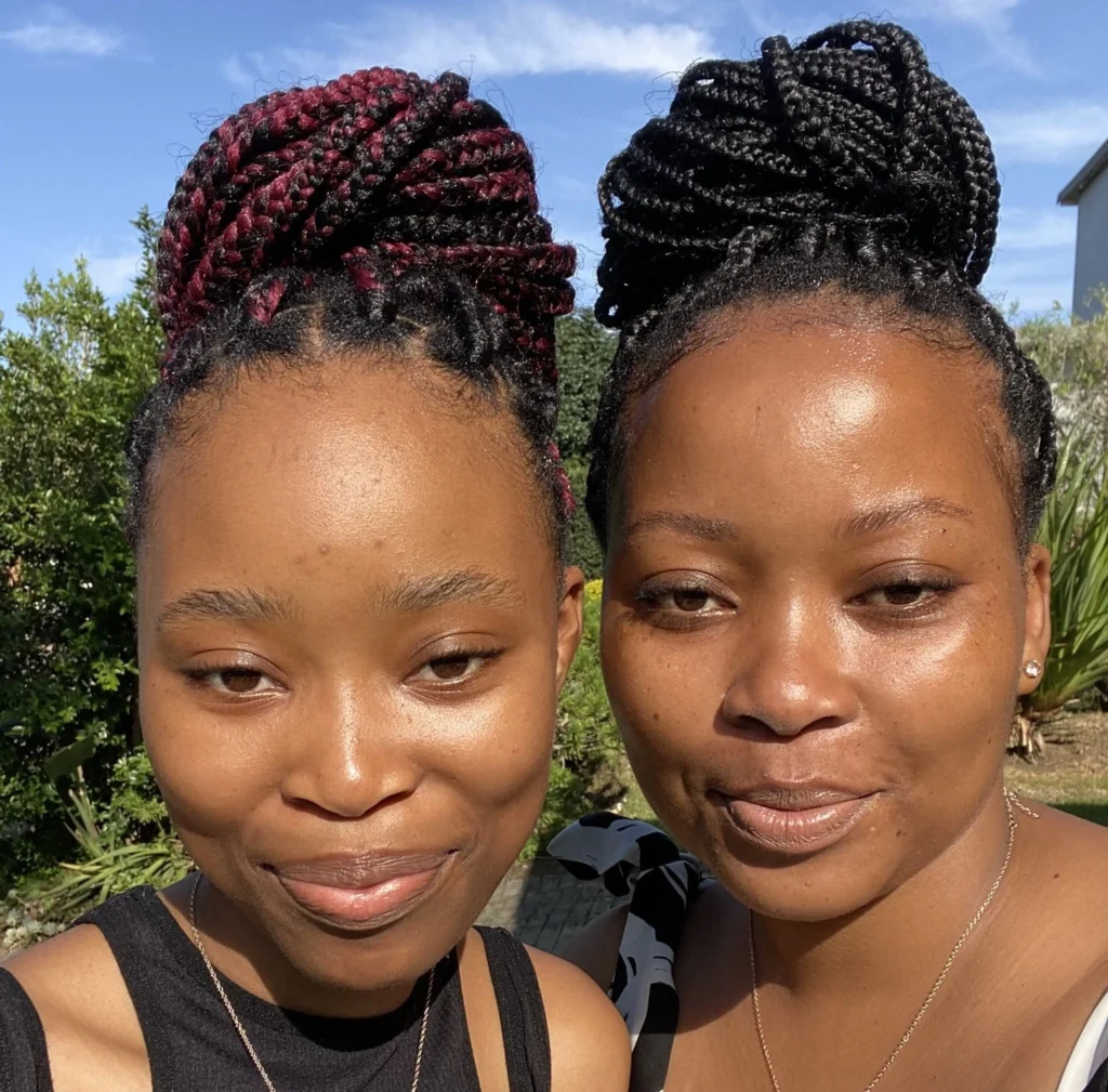 “Her face can open my phone” — Lady shares photo of herself and her look-alike niece 