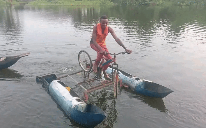 "It's actually working" - Bayelsa man stuns many as he builds water bicycle that rides on rivers