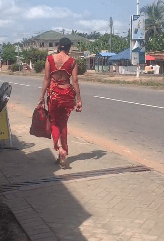 "Hope she is normal?" - Video of lady with strange walking style on the road causes buzz online