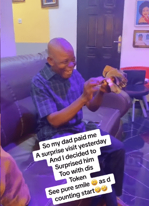 "See pure smile on his face" - Lady gifts dad wads of cash in video, his reaction melts hearts