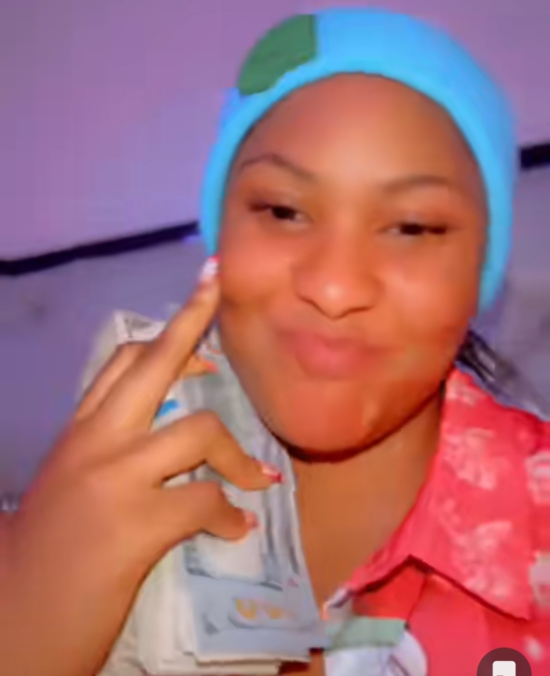 Beautiful lady flaunts international passport, bundles of dollar notes as she gets engaged to an Anambra man