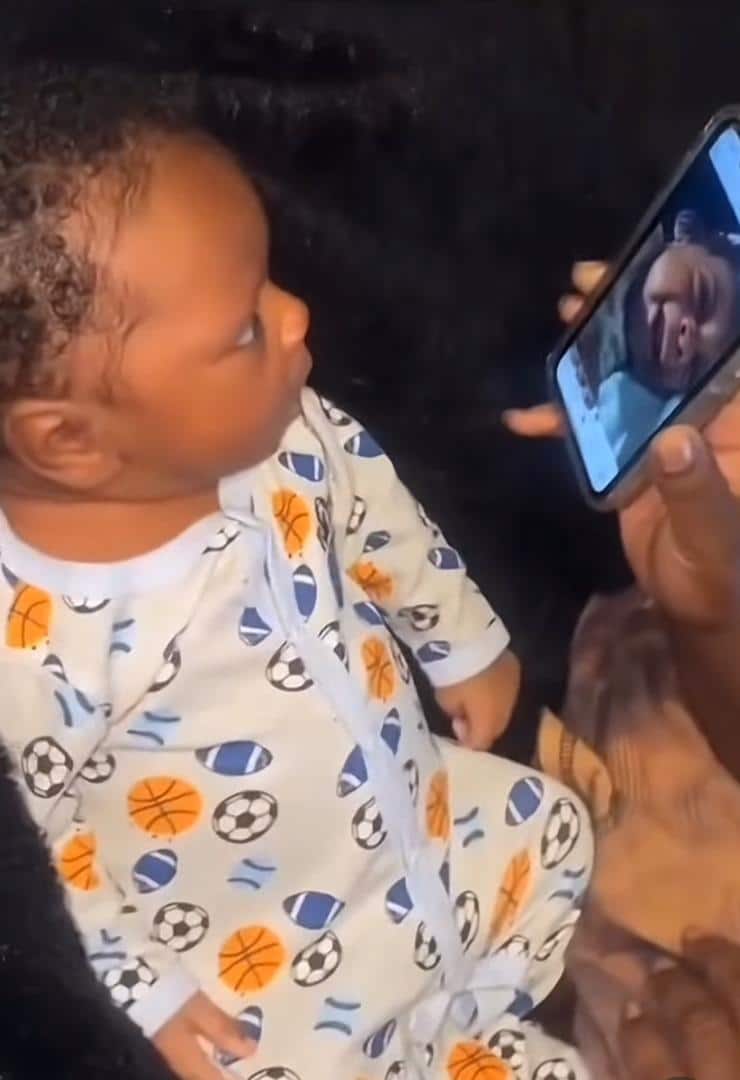 Priceless reaction as baby watches a video of himself crying