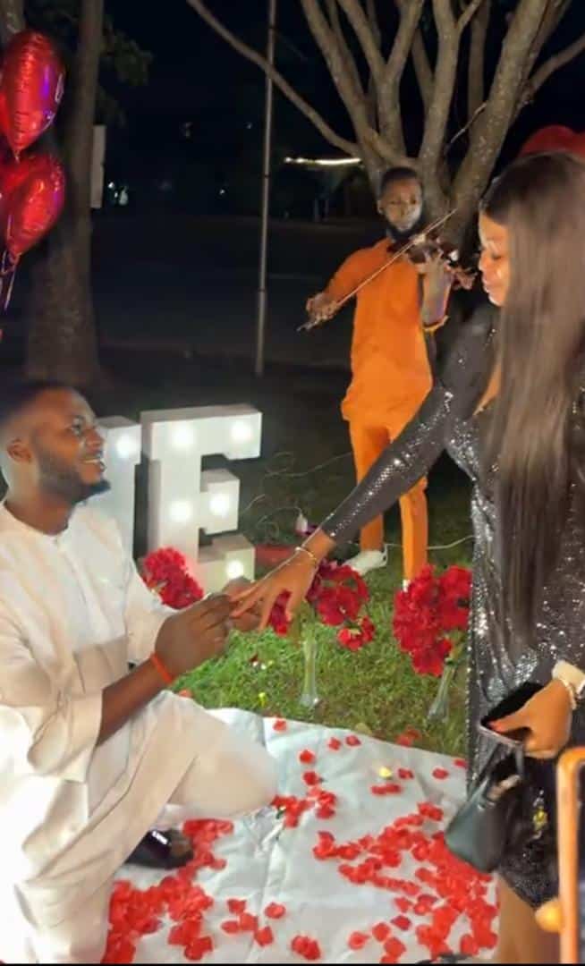 Lady breaks down in tears as man turns dinner into surprise proposal