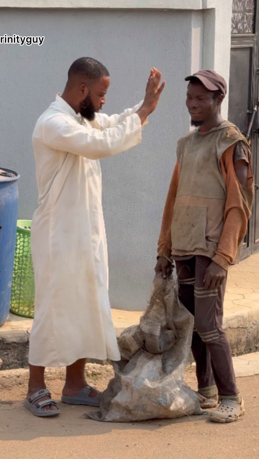 Trinity Guy gets netizens emotional as he changes the life of graduate who picks rusted iron on the street to sell