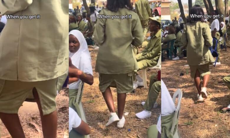"She still wear hair wey no be her own" - Backlash as corper is seen putting on skirt at NYSC function