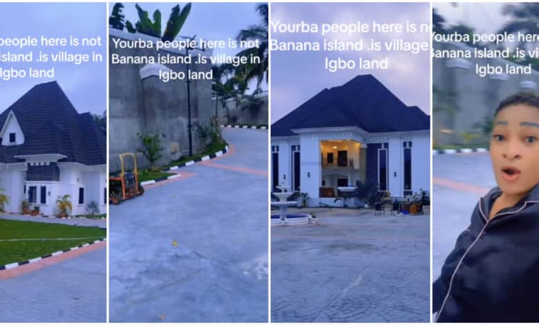 "This is not Banana Island" - Lady stuns many as she shows off multimillion-naira mansion estate in her village