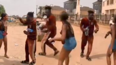 "These guys should be arrested" – Outrage as lady is publicly harassed by a group of men over her choice of outfit