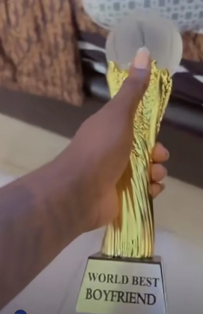“The award even fine pass AFCON trophy” — Lady gifts her boyfriend a trophy for being the best 