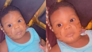 "I pray this is not real" – Reactions as Nigerian lady shows off newborn baby's tribal marks