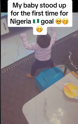 little baby stands first Nigeria's goal