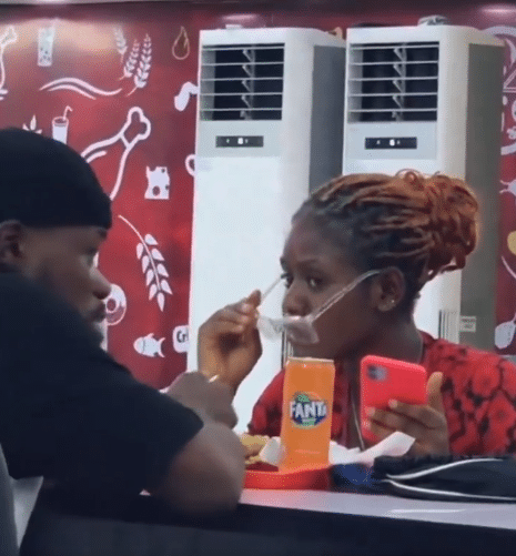 lady's reaction stranger food