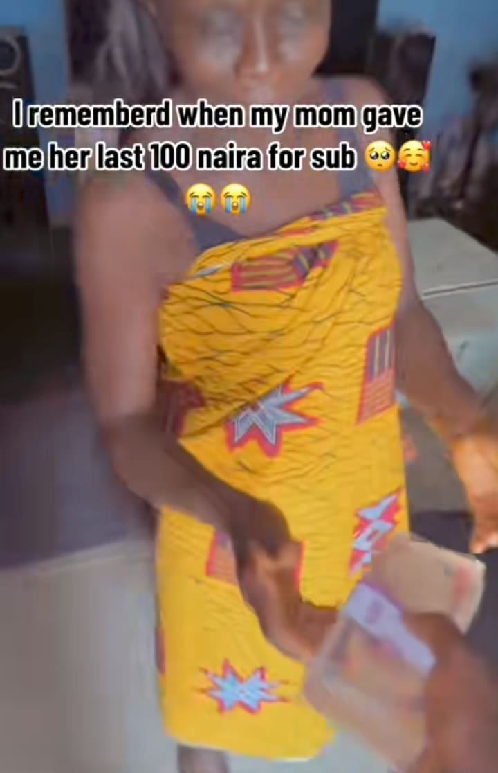 "Funds making mama smile" – Young man gifts mother bundles of money for giving him her last N100 to sub