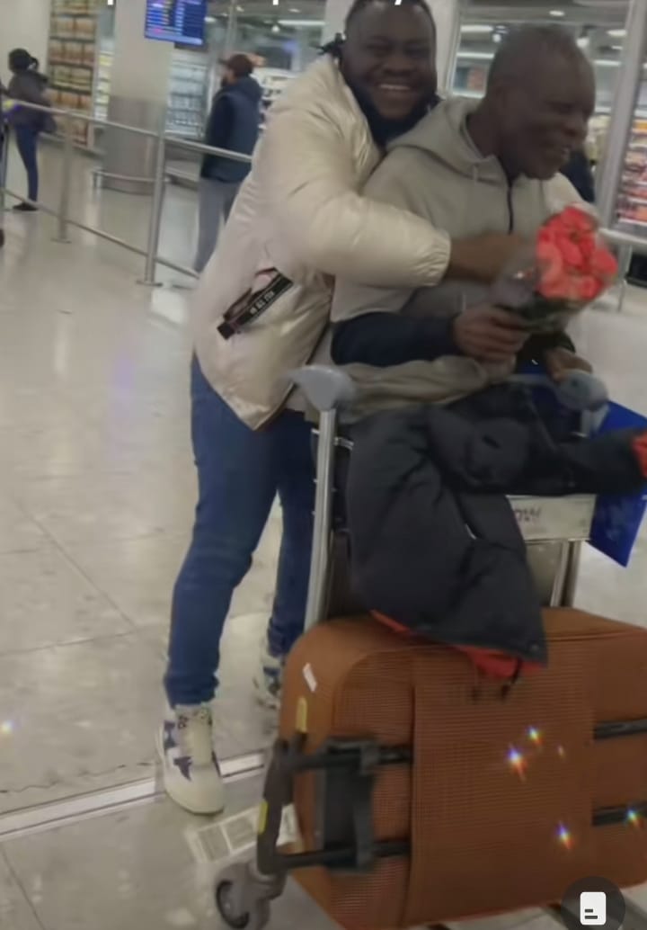 Son father prostrates dad London airport