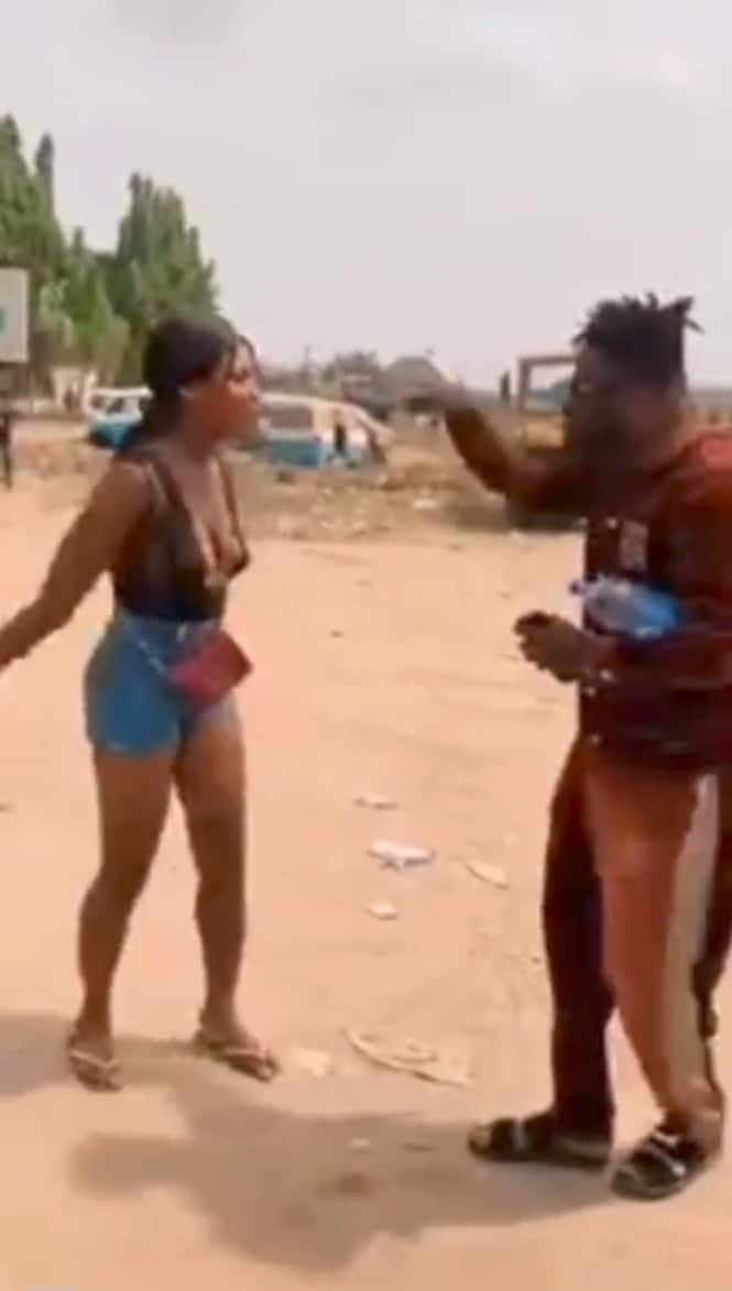 Lady harassed by a group of men over her choice outfit