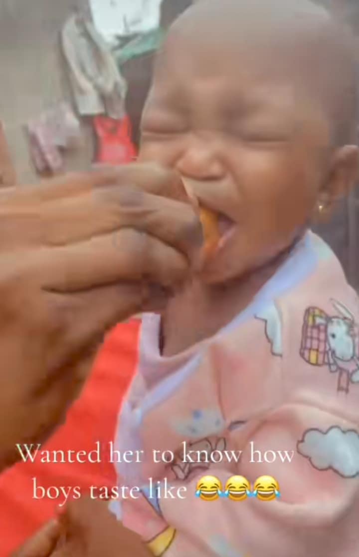 "How love tastes without money" – Little girls facial expression trends as she licks African Star Apple for first time 