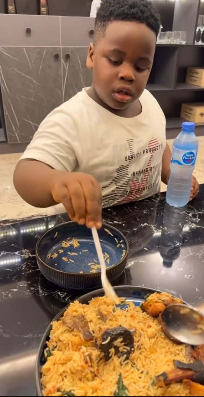 "Why is he breathing like that?" - Cubana Chief Priest blasted over new video with son