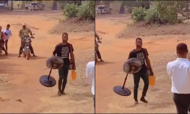 student standing fan class