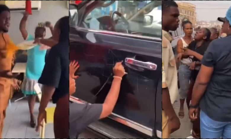 Drama as lady spots her man with another woman, damages his car