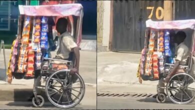 Physically challenged man selling goods from wheelchair