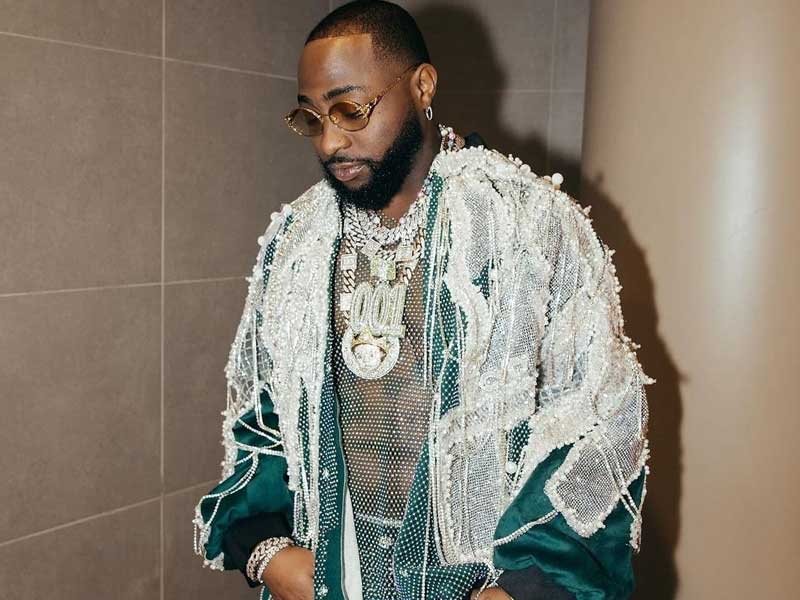 Davido reacts to video of Prophet Odumeje dancing to his song 'Away' in a club