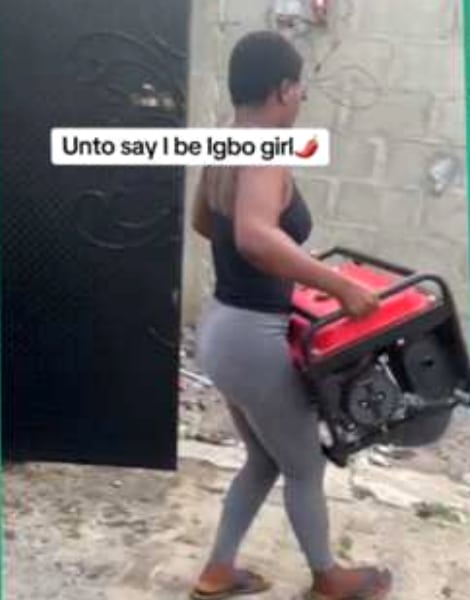“Valid reason to break up with her” – Men share their two cents after lady effortlessly lifted a huge generator by herself