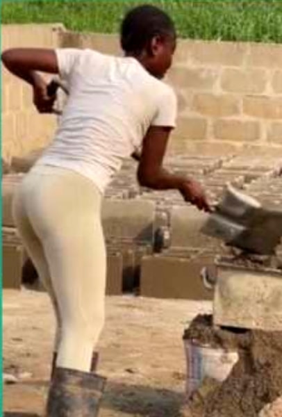 "Who's she, I want to marry her" - Lady seen in video molding blocks gets applauds online