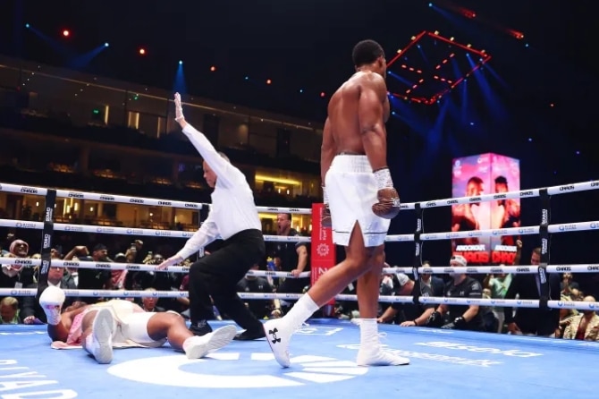 Boxing: Anthony Joshua brutally knocks out Francis Ngannou in two rounds in heavyweight clash