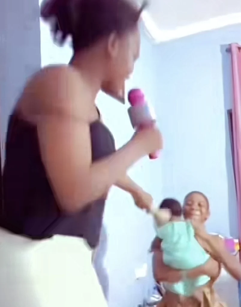 “This our generation of motherhood nawa” — Mother starts concert with bell and microphone for daughter who refused to let her sleep at night 