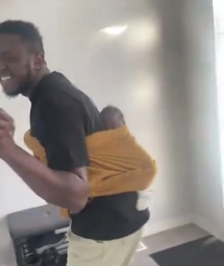 Man finally holds his own son a year after manifesting by carrying a ‘pillow baby’