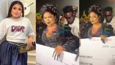 Moment Bobrisky receives one million naira cheque for being Best Dressed Female at movie premiere
