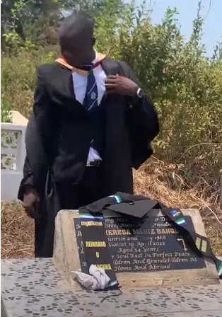 man graduation mother's grave