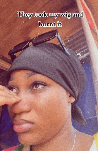 "It's a sin" - Nigerian lady cries out as church removes her wig and burns it, orders her to kneel