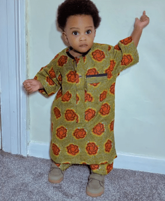 "Wetin Be This?" - Reactions as little boy in UK rocks oversized clothes Grandma sent from Nigeria