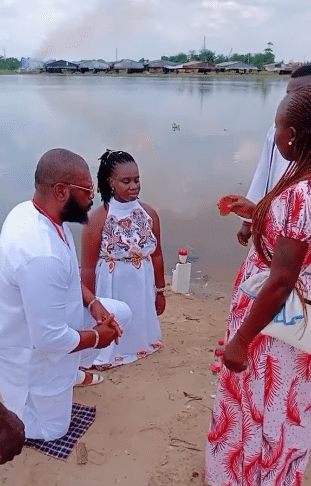 couple wedding ceremony riverside