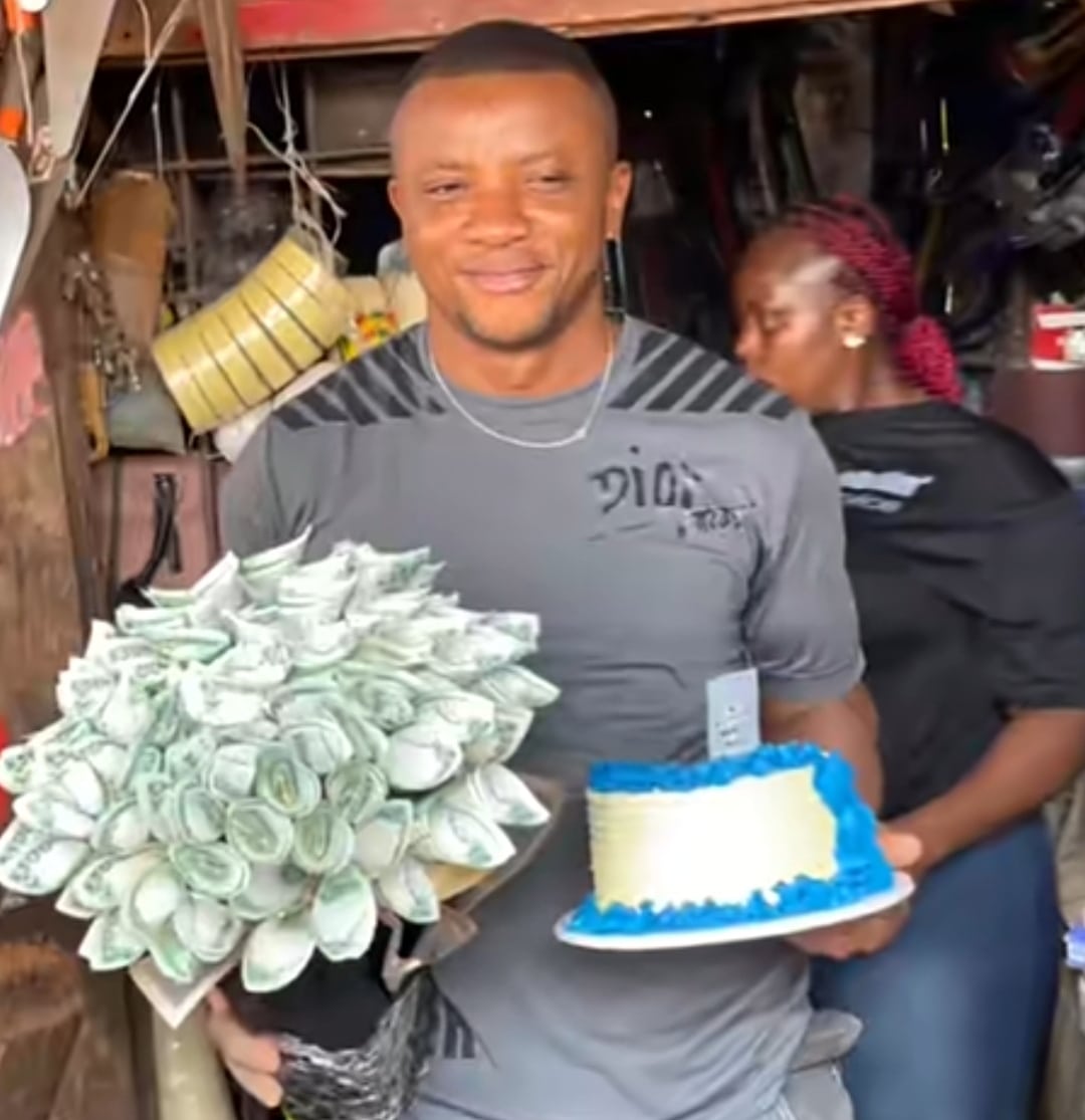 "My world best" - Emotions flow as wife storms husband's shop, gifts him money bouquet, phone, cake on his birthday