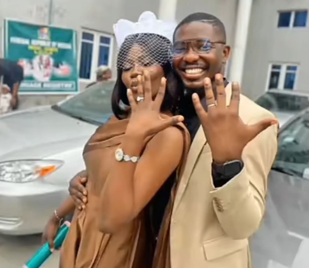 "What's my name, Mrs. what?" - Heartwarming moment as bride playfully asserts 'Mrs.' status with husband's surname