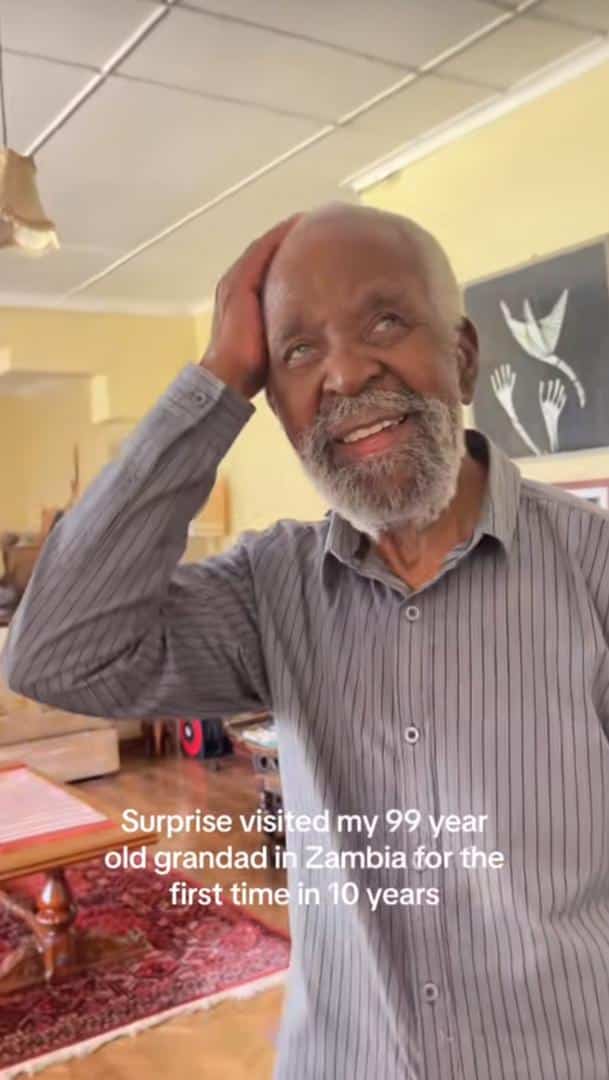 Moment man pays surprise visit to 99-year-old grandfather after 12 years apart