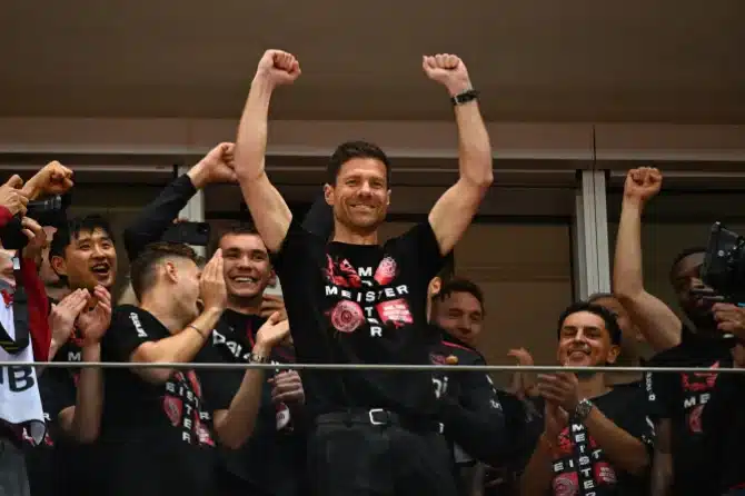 Xabi Alonso drenched in beer during Leverkusen title celebration