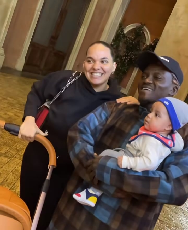 Moment caucasian lady requests for photo with Portable, asks him to carry her baby